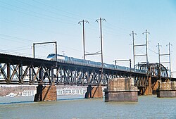 Amtrak Acela Express crosses the Susquehanna River in Maryland on a bridge built by the PRR in 1906.