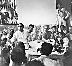 Gandhi with Huseyn Shaheed Suhrawardy (left) and Sheikh Mujibur Rahman (far right) during Noakhali riots in October 1946