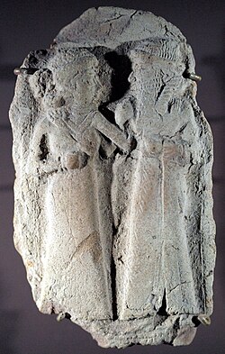 Terracotta of a couple, probably Inanna and Dumuzi, Girsu, Amorite period, 2000–1600 BC. Louvre Museum AO 16676.