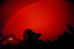 Unenhanced photo of a red (monochrome) rainbow