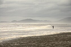 A fisherman on Mar Brava beach, on the Pacific Ocean coast