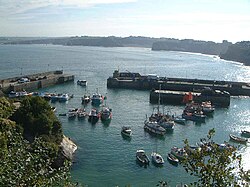 An easterly view over Newquay Harbour with some of the surfing beaches in the background