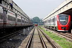 A DEMU train (right) at Kamalapur railway station, Dhaka