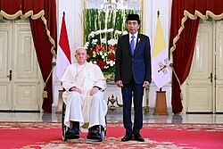 Francis with then-President of Indonesia Joko Widodo in September 2024. Francis had publicly used a wheelchair since 2022.