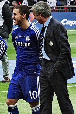 Mourinho with Chelsea playmaker Eden Hazard in 2015. Their relationship soured in the following season.[149]