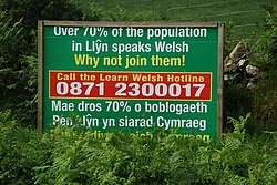 Sign promoting the learning of Welsh