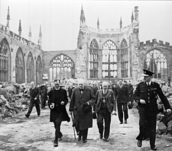 Churchill walks through the ruins of Coventry Cathedral, 1941
