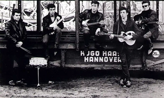 Left to right: Pete Best, George Harrison, John Lennon, Paul McCartney, and Stuart Sutcliffe at Hamburg Funfair in 1960, photographed by Astrid Kirchherr. Sutcliffe left the Beatles in 1961 and Ringo Starr replaced Best in 1962.