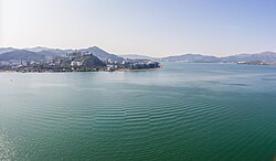 The campus is adjacent to the Tolo Harbour