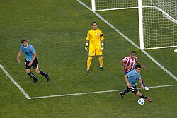 Paraguay's Justo Villar (centre, in yellow) was voted best goalkeeper of the 2011 Copa América.