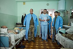 Ukrainian president Zelenskyy visiting a hospital in the Odesa Oblast, where injured Ukrainian defenders are seen treated in July 2022 during the Russo-Ukrainian war