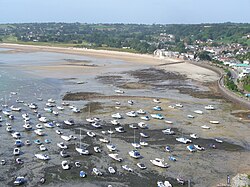 The harbor of Gorey, Jersey falls dry at low tide.
