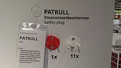 An IKEA socket cover featuring the name PATRULL (Swedish for "patrol")