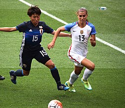 Morgan being challenged by Hikari Takagi (15) during a match against Japan in Cleveland on June 5, 2016