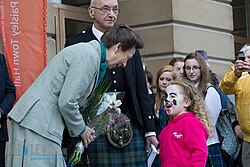 Princess Anne speaking to a girl while on a public engagement