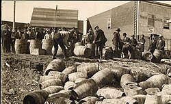 Law enforcement confiscate stores of alcohol in Elk Lake in an effort to enforce prohibition. The prohibition measures were introduced in 1916 and were not repealed until 1927.