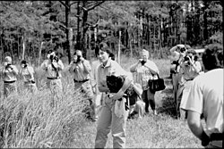 U.S. Fish & Wildlife Service Director Mollie Beattie prepares to release a bald eagle named "Hope" in 1994, marking the announcement that the species was no longer considered endangered