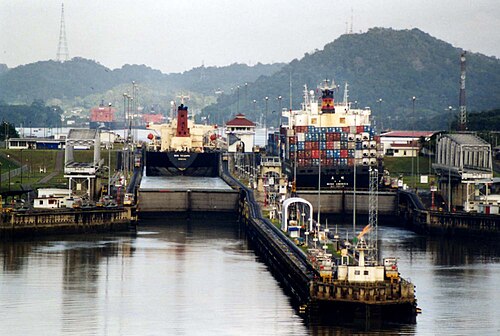 Two Panamax ships seen almost touching the walls of the Miraflores Locks.