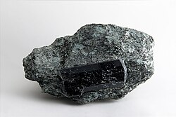 Black dravite on a grey matrix