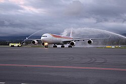 Iberia Airbus A340-600 aircraft on its inaugural flight to Quito - Mariscal Sucre International Airport from Barajas on the 28th of October, 2013. This picture was taken after the first transatlantic flight of the airport linking it to Europe non stop had landed,and it was celebrated with the traditional water cannon salute.