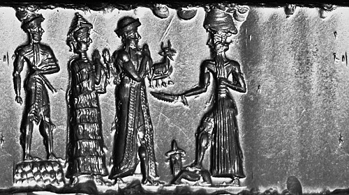 Old Babylonian Cylinder Seal, hematite. The king makes an animal offering to Shamash. This seal was probably made in a workshop at Sippar.[37]
