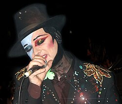A figure in the new romantic movement, Boy George of Culture Club (performing in 2001) was influenced by glam rock icons Bolan and Bowie.[31]