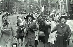 People celebrating the liberation of Denmark at Strøget in Copenhagen, 5 May 1945. Germany surrendered three days later.