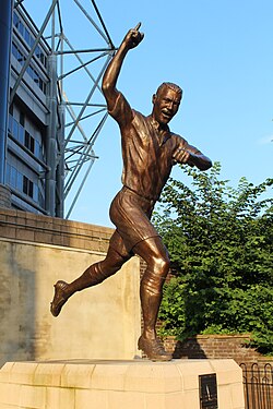 Shearer's statue outside St James' Park, featuring him performing his signature goal celebration