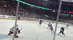 McKenna (right) scoring the goal which completed his first collegiate hat-trick on January 23, 2026