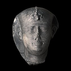 Green sandstone head of a king of Nectanebo II.