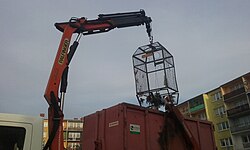 Emptying of segregated rubbish containers in Tomaszów Mazowiecki, Poland