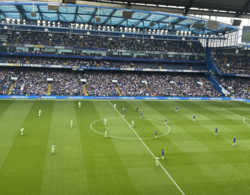 Chelsea F.C. Women (right) lining up in a 4–1–2–3 at kick-off in April 2025