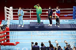 Men's middleweight boxing event podium at the Tokyo 2020 Summer Olympics