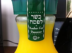 The label on a bottle of orange juice certifying that it is kosher for Passover