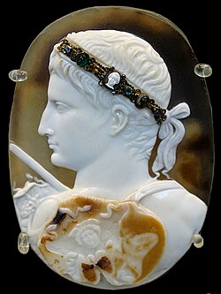 Augustus shown with an aegis thrown over his shoulder as a divine attribute in the Blacas Cameo; the hole for the head appears at the point of his shoulder.[14]