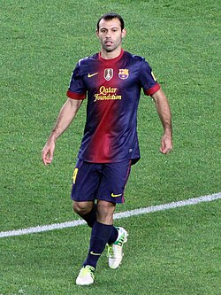 Mascherano playing for Barcelona in 2012
