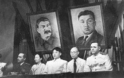 Kim Il Sung (center) and Kim Tu-bong (second from the right) at the joint meeting of the New People's Party and the Workers' Party of North Korea in Pyongyang, 28 August 1946