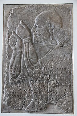 Neo-Assyrian relief from Nimrud depicting a tribute-bearer