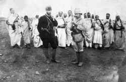 Mustafa Kemal (left) with an Ottoman military officer and Bedouin forces in Derna, Tripolitania Vilayet, 1912