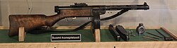 Suomi M31 submachine gun with 70-round drum magazine attached, 20- and 50-round box magazines