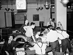 The Globe and Mail staff await news of the D-Day invasion. June 6, 1944.