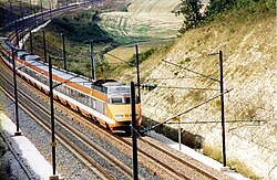 A TGV Sud-Est set in the original orange livery.