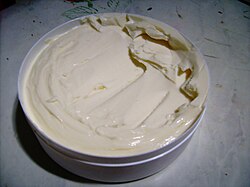 Catupiry, a Brazilian cheese developed by the Italian immigrant Mario Silvestrini in 1911[75]