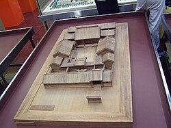 Model of a Chinese Siheyuan in Beijing, which shows off the symmetry, enclosed heavy platform and a large roof that floats over this base, with the vertical walls not as well emphasized.