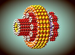 A depiction of a putative technomimetic molecular planetary gear set. Smalley questioned whether devices like these could be constructed using an enzyme-like mechanical process, either in an aqueous solution or with some other chemistry, and whether such devices would be operational at all.