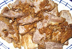 Beef roasted with vinegar and sliced with spiced paste, often called "cold beef"