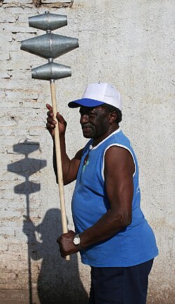 Afro-Argentine man in Merlo with a masacalla, used for Argentine candombe.