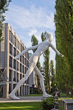 Walking Man by Jonathan Borofsky in front of the business premises on Munich's Leopoldstraße