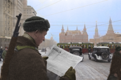A Soviet soldier reading Pravda, a broadsheet newspaper, in 1941