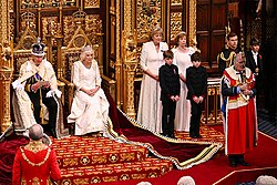 Stirrup (right) holding the Sword of State at the 2023 State Opening of Parliament